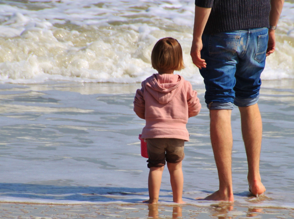father and daughter spending time by the shore, seeking help with a chapter 39 case, paternity established in Florida