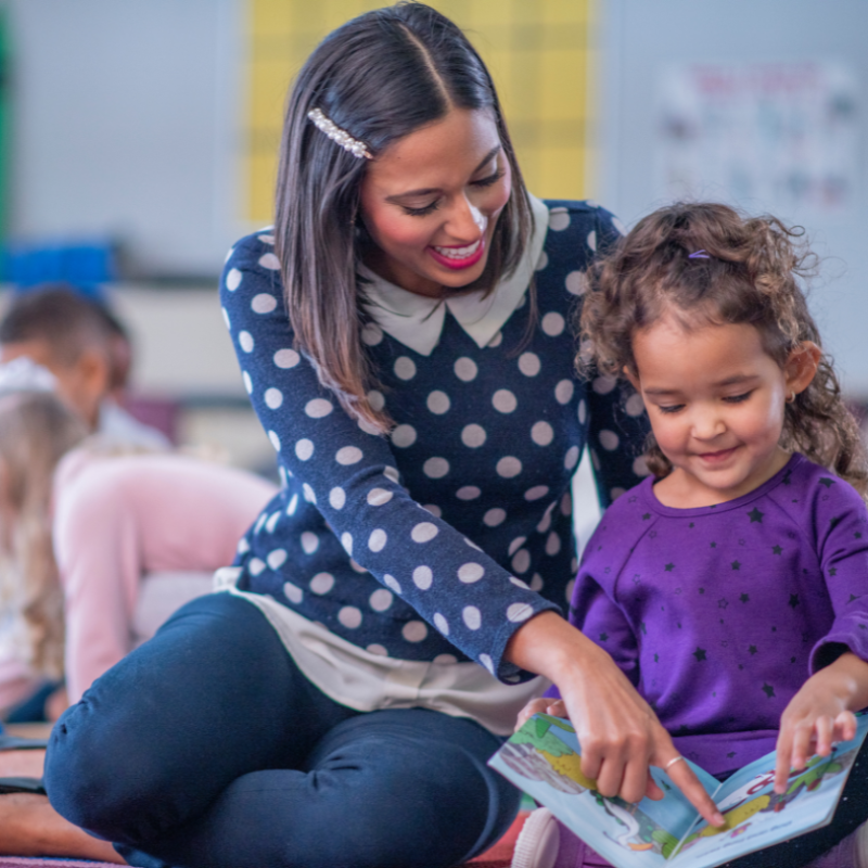 mom reading with her daughter, child support attorney in Pinellas County